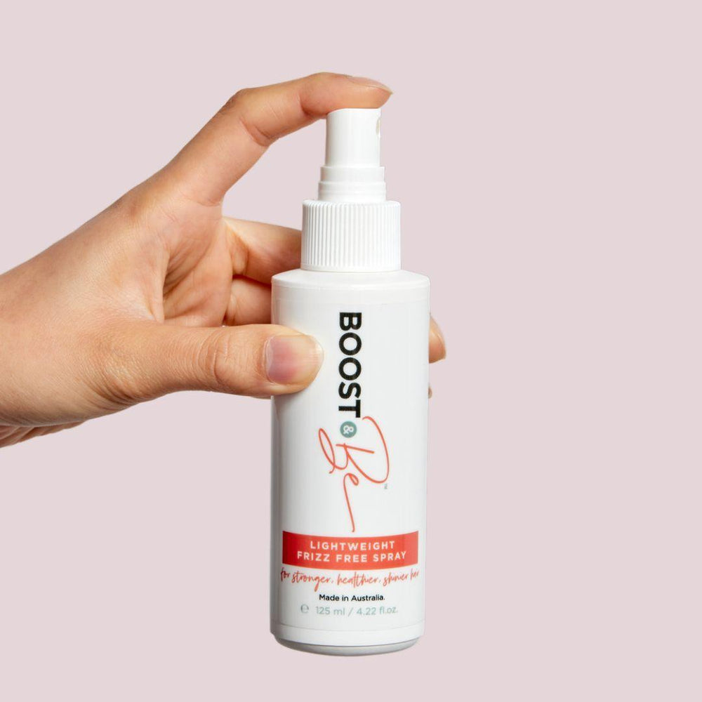 Frizz Free Spray Boost & Be Hand shot